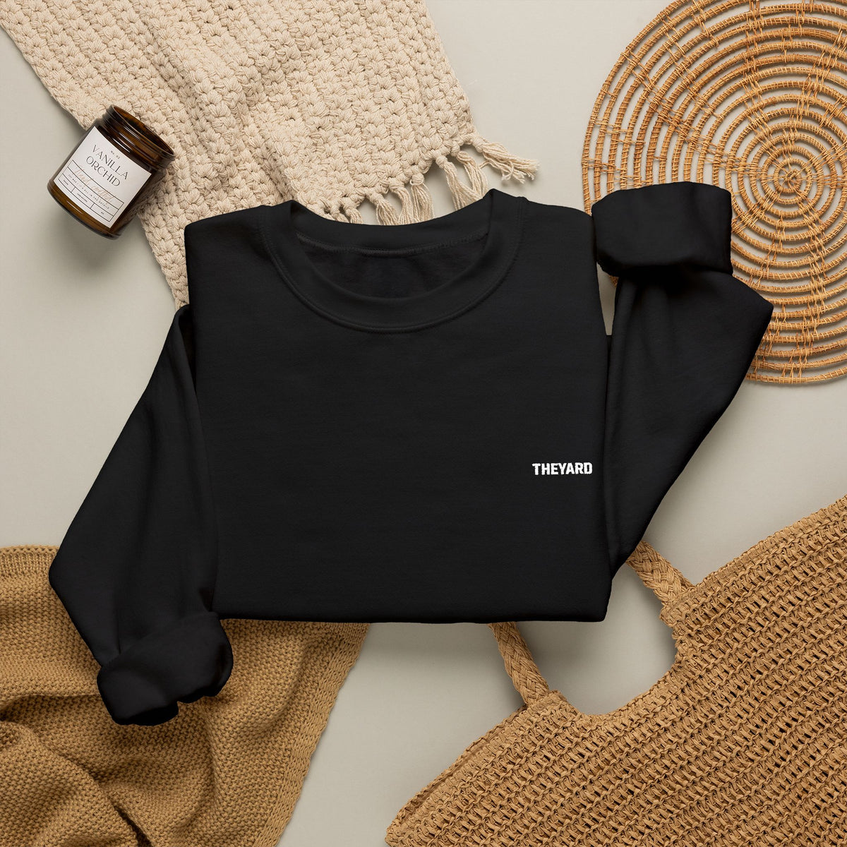 Minimal Black Crewneck Sweatshirt — Chest & Wrist Logo